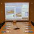 お知らせ meeting room with projector screen